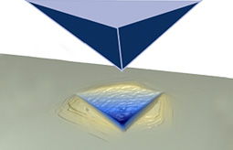 Diamond-tip-pushed-into-sample-during-instrumented-indentation