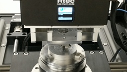 Rtec Instruments Tribometer Performing Friction Test on Sample Rtec Instruments tribometer performing friction and wear test on a flat sample with rotating stage
