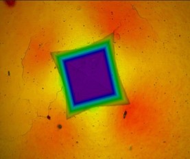 Hot Hardness Indentation at 650°C – High-Temperature Vickers Hardness Test Vickers indent on metallic sample tested at 650 degrees Celsius showing enlarged deformation zone under optical microscopy